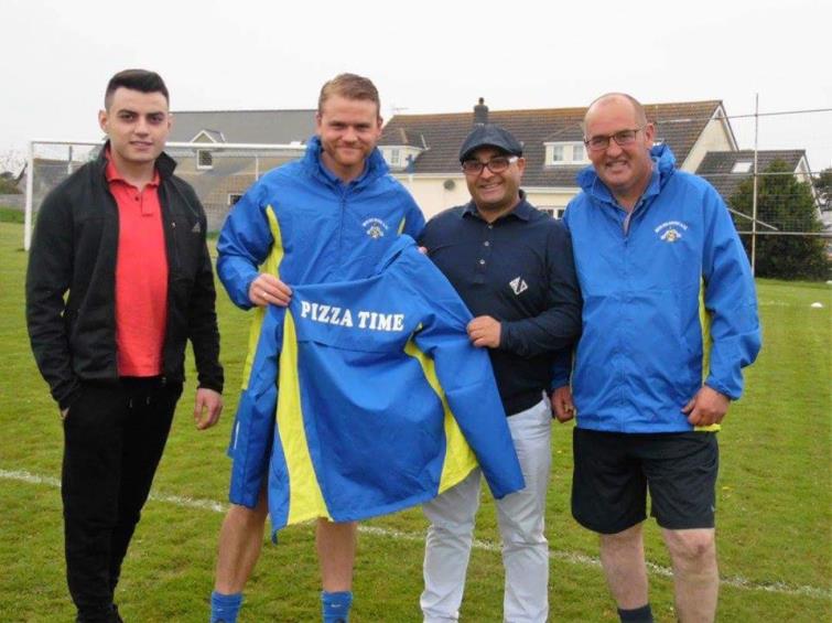 Steve Price with Merlins Bridge tracksuit presentation